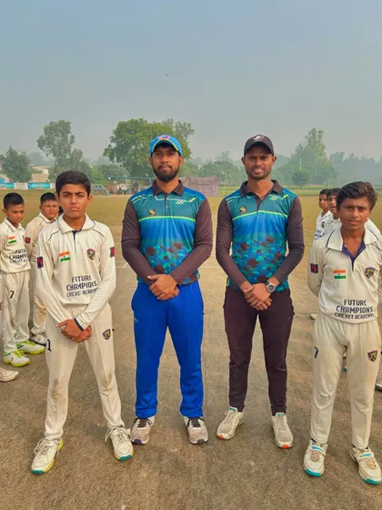 The captains and coaches pose for a photo before the match.
