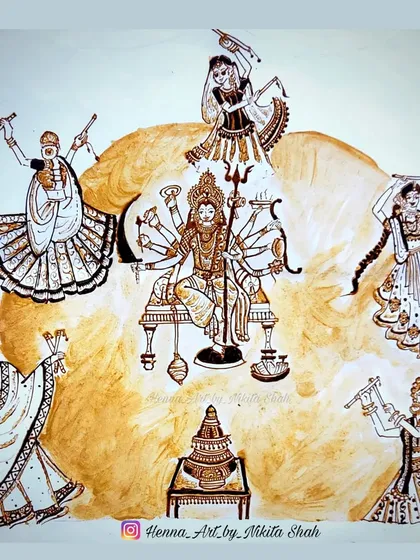 The Navratri henna painting in progress, showing the Goddess and Garbo surrounded by five different garba and dandiya dancers. Each figure is drawn with unique details in their attire and pose.