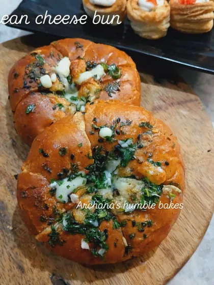 My Korean Cream Cheese Buns are a must-try. These soft buns are filled with sweetened cream cheese and soaked in a savory garlic butter sauce, then baked until golden.