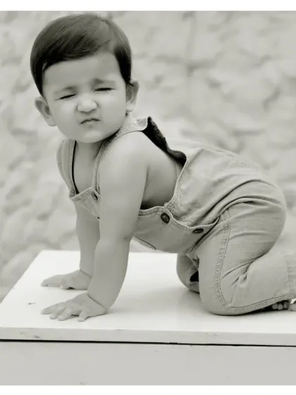 A funny face captured in a timeless black and white photo. Sometimes the most playful moments make the best memories.