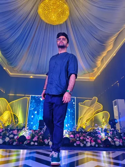 This is my office. On stage for a Sangeet night, ready to drop the beats that will make your family and friends dance all night. The lights, the decor, the energy, this is where the magic happens.