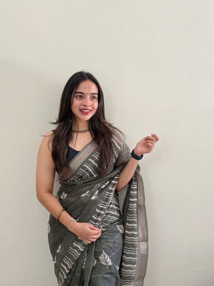 A candid and happy shot of the same client. This natural makeup style allows her personality to shine through, looking effortlessly beautiful.