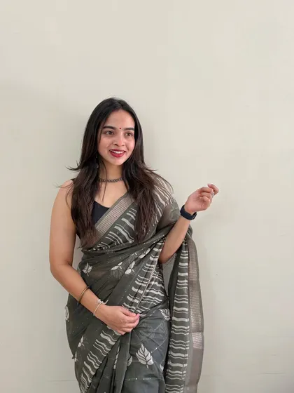 A candid and happy shot of the same client. This natural makeup style allows her personality to shine through, looking effortlessly beautiful.