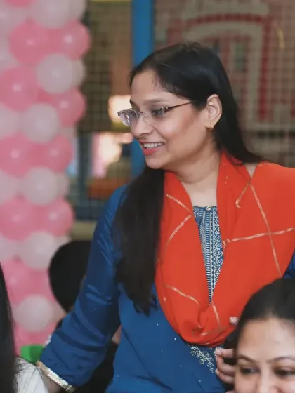 A candid shot of a guest enjoying the party, reflecting the relaxed and happy atmosphere of the event.