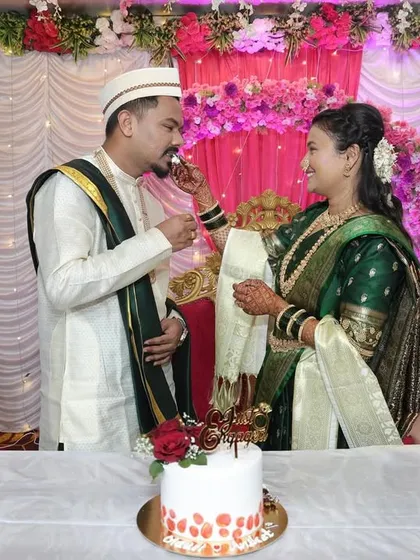 A sweet moment as the groom feeds the bride a piece of their engagement cake. It's these small memories that we are so happy to be a part of.