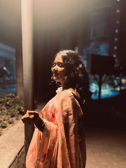 Another angle of my floral saree look, perfect for a festive wedding performance.