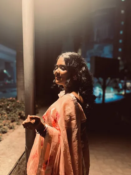Another angle of my floral saree look, perfect for a festive wedding performance.