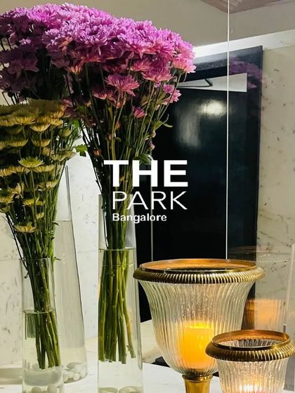 Beautiful bouquets and candles light up a corner of our hotel. This shows how we can create a warm ambiance while conserving energy.