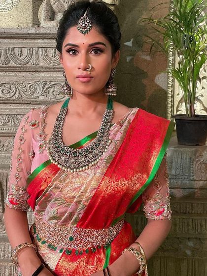 A powerful and poised portrait. The defined eyes and the overall clean finish of the makeup give her a regal and confident look.