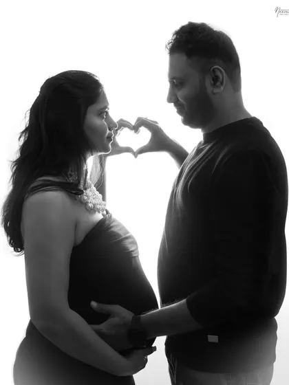 A timeless black and white portrait that focuses purely on emotion. Here, I used silhouette lighting to capture the shape of their love and the new life they have created together.