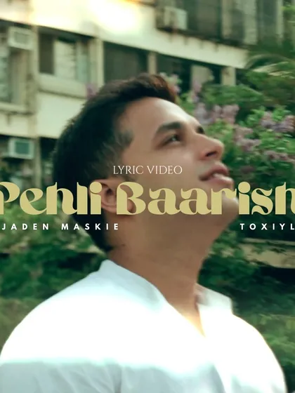 The title card for the official lyric video of 'Pehli Baarish'. This song captures the feeling of an instant, unspoken connection, blending romantic emotion with an energetic indie-pop rhythm.