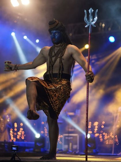 A model portrays Lord Shiva on the runway, complete with a trishul and damru. A powerful and theatrical moment from the IIT Roorkee fashion show.