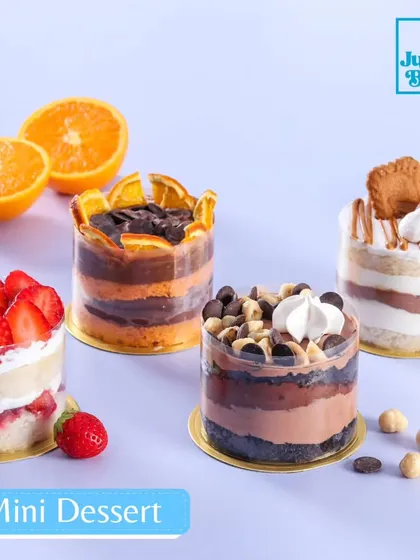 My mini desserts are perfect for when you want a little bit of everything. This shot features some of our most loved flavors: the fresh Vanilla Strawberry, zesty Orange Chocolate, nutty Chocolate Hazelnut, and the popular Vanilla Biscoff. They are great for parties or just a personal treat.