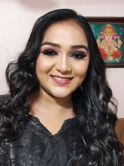 A classic smokey eye look with a hint of pink. This is a very popular choice for parties and evening events.