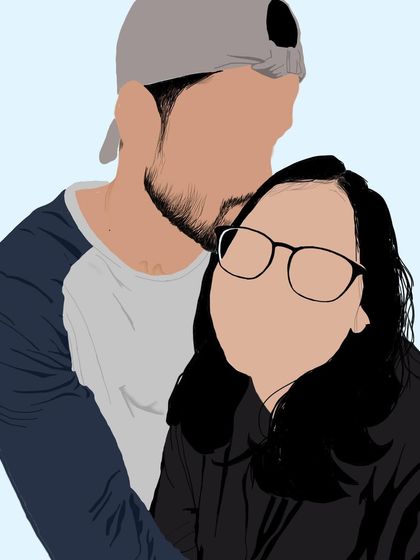 A close-up faceless portrait that captures a sweet, affectionate moment between a couple.