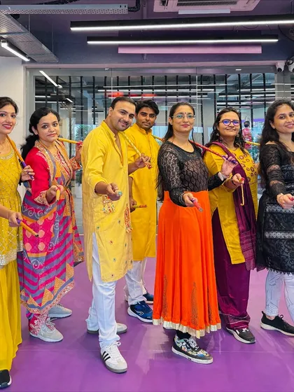 The Dandiya squad posing with their sticks. My classes are a great way to meet new people and get into the festive mood before Navratri begins.