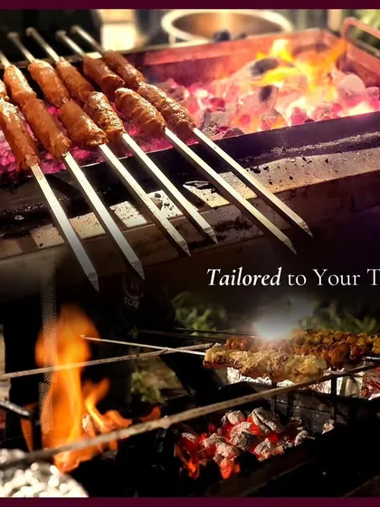Our live grill station in action, with seekh kebabs cooking over hot coals. We tailor our menus to your taste, transforming every bite to perfection for both elegant affairs and casual gatherings.