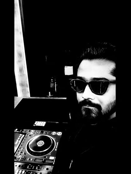 Nothing is as perfect as black and white. A selfie from the DJ booth, capturing the mood of a Friday night.