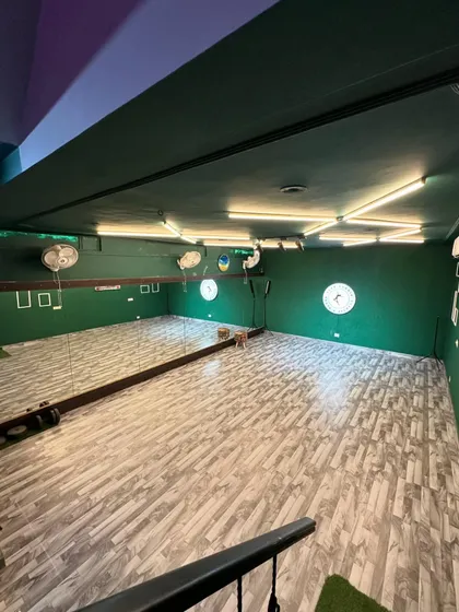 This overhead view shows the full layout of the studio. You get a spacious floor, a full wall of mirrors, and plenty of room to move, create, and teach.