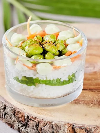Our Classic Philadelphia Sushi Cup, featuring cream cheese, cucumber, and avocado. This shot highlights the simplicity and freshness of this popular flavor combination.