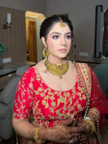 A candid shot showing the soft, diffused eyeshadow and perfectly blended skin work. The look is elegant and photographs beautifully from all angles.