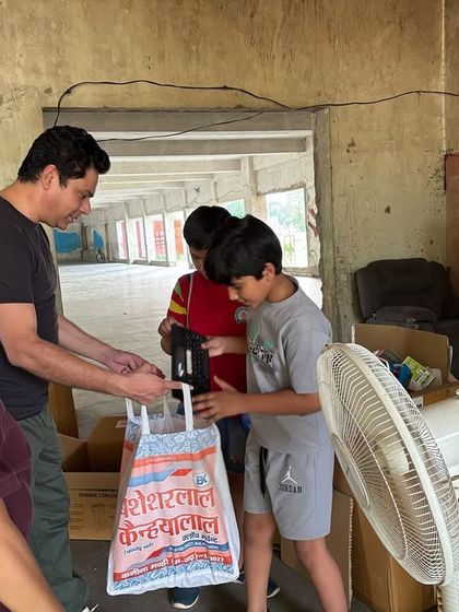 Residents of Mayfield Gardens, including young children, actively participate in a two-hour collection drive, sorting and handing over everything from soft plastics to e-waste.