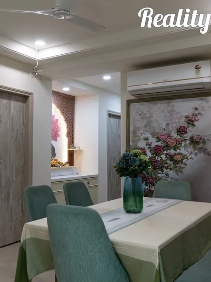 The final look of a beautiful pooja space, featuring a stunning lotus mosaic in marble and a custom carved arch. This is the reality of our 3D visualization.