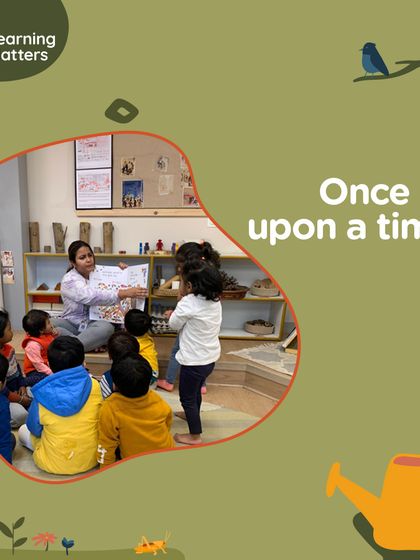 An educator reads to an engaged group of children. Through expressive storytelling, she brings the characters to life, modeling a love for reading and building a strong sense of community.