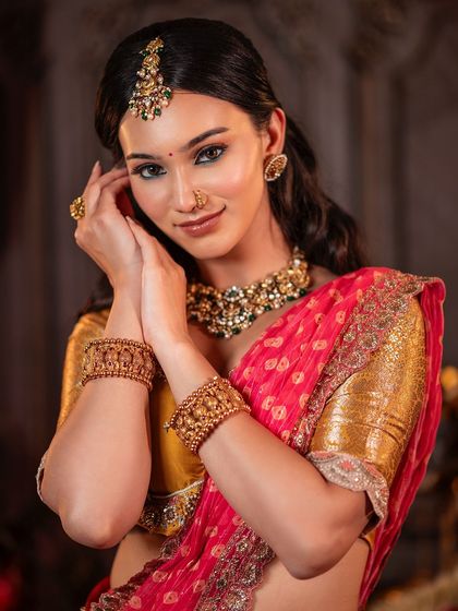 A serene and elegant look for this model, showcasing one of my classic half saree designs. The mustard yellow Kanchi blouse is paired with a pink brocade skirt and an embroidered dupatta.