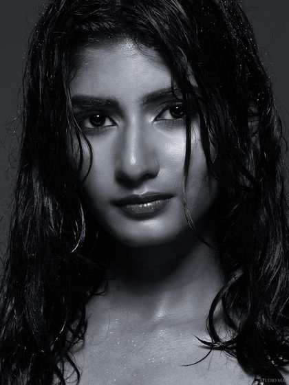 Another powerful black and white close-up from the wet look series, capturing a raw and direct gaze.