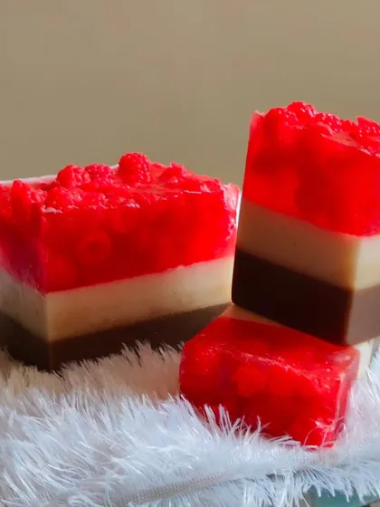 Slices of the three-layered raspberry, vanilla, and chocolate soap.