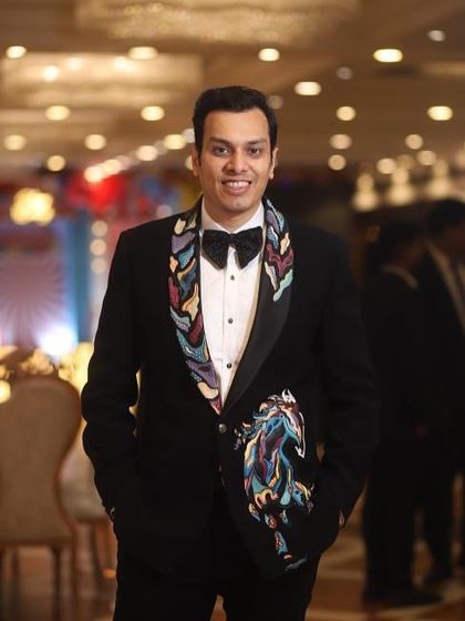 A full-length shot of the client in the hand-painted horse tuxedo, showing how the unique design looks from a distance.