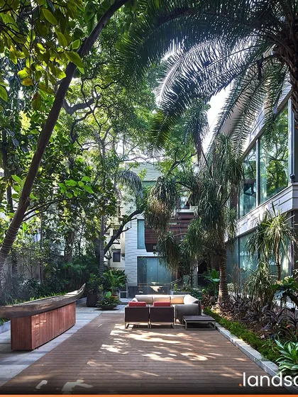 For this private residence in New Delhi, we designed the landscape to be an extension of the home itself, creating a lush, private sanctuary. This project demonstrates our ability to craft intimate, nature-centric environments that blur the lines between indoor and outdoor living, promoting wellness and a constant connection to nature.