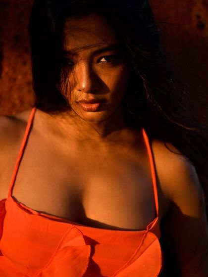 Continuing the fiery, sun-drenched theme, this shot captures a slightly different angle. The play of light and shadow remains the key element, creating a raw and powerful image that feels like a still from a dramatic film.