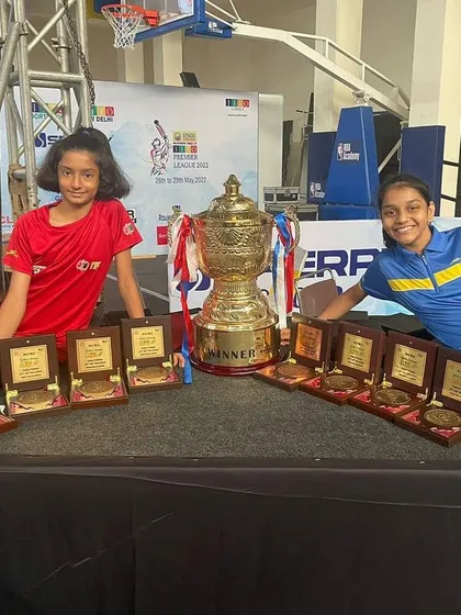 Another shot of the girls celebrating their haul of medals.