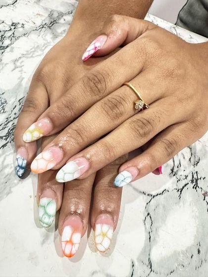 Another look at the beautiful multi-colored blooming gel effect, creating a soft, floral pattern.