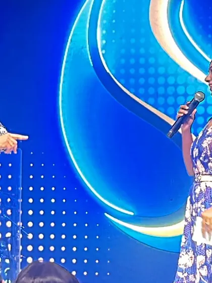 A side-profile shot with Shaan, showing a moment of conversation during the show.