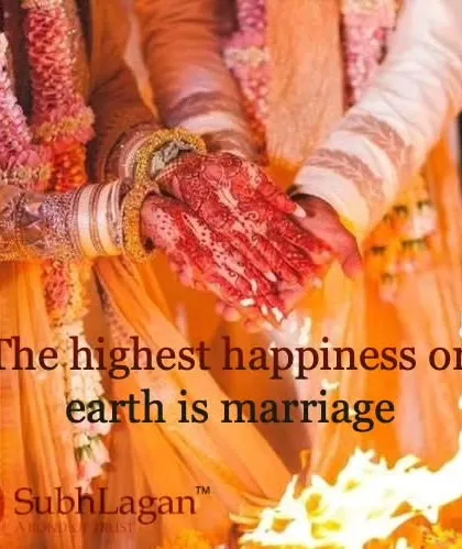 The bride's hands, adorned with mehndi, are placed in the groom's during the Kanyadaan ritual. This signifies the sacred trust placed in the groom by the bride's family.
