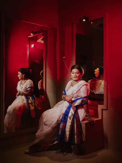 An artistic bridal portrait using creative lighting and reflections. I work to create stunning, magazine-worthy portraits that showcase the bride's elegance and the unique mood of her wedding day.