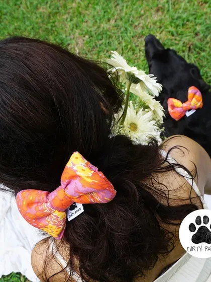 This is what it's all about. A quiet moment with my best friend, sharing a little bit of style. I started this brand to celebrate this exact feeling, and our matching bow sets are made for moments just like this.