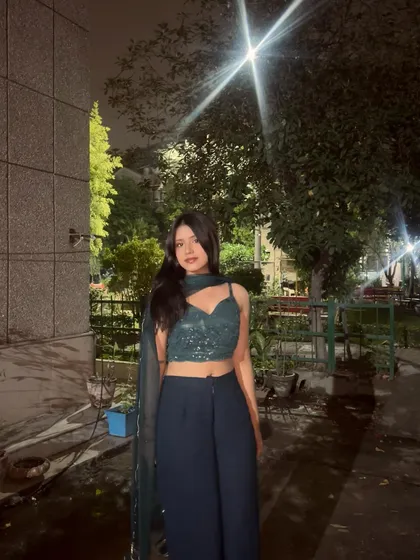 Dressed for a night out. I'm comfortable performing in a variety of settings, from casual cafes to more formal events.