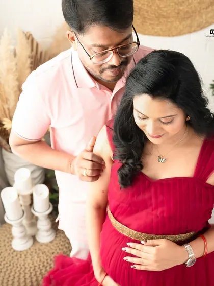 A sweet moment of adjustment and care. These candid-style shots show the gentle interactions between partners that make a maternity session so special.