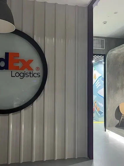 The finished reception for FedEx in Hyderabad, where I transferred ideas from the studio to the final space. The design uses industrial materials to reflect a company that masters the transfer of shipments worldwide.