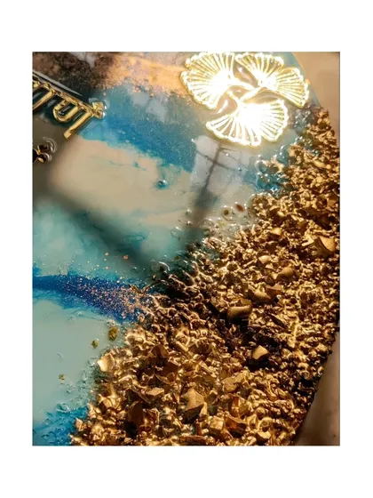 These images showcase my round Navkar Mantra frame, featuring a stunning blue ocean resin design with gold geode edges. It's a modern and artistic way to display this powerful Jain mantra.