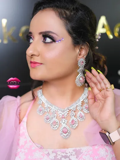 A side profile of the pink-themed look, showing how the makeup, jewellery, and outfit all work together. This is a key part of the training I provide.