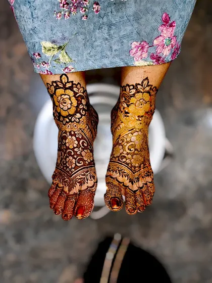 Mehndi isn't just for hands. This is an example of my bridal foot mehndi, with detailed floral patterns covering the feet and ankles for a complete and beautiful bridal look.