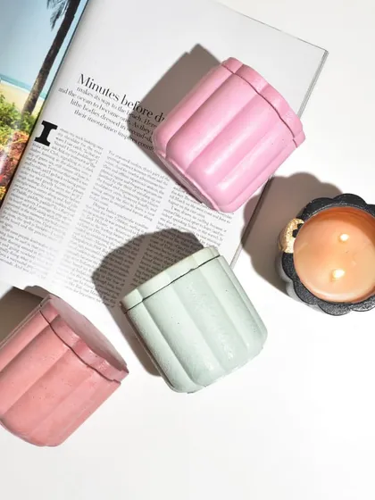 An overhead shot of our pastel Daisy Jars and the black and gold version. These modern jars are perfect for any aesthetic.