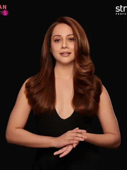 A classic glam look for the Streax Professional hair campaign. The makeup features a soft smokey eye and a neutral lip to complement the rich, brown hair color, creating a sophisticated final image.