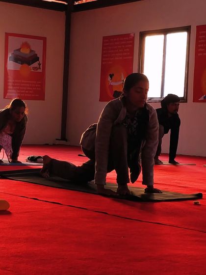 A participant in our Ahmednagar workshop, backlit by the morning sun, deep in her practice. It is a privilege to witness and guide such sincere seeking.