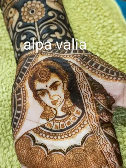 Creating a bride's face is a specialized skill you will learn in the advanced part of my course. This close-up shows the delicate shading and line work required for portrait mehendi.